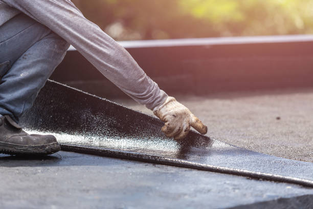 Professional Emergency Waterproofing technician working in Greenlawn, NY